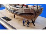 Period figures carved by Kenneth Clark both enhance the presentation and give the Dockyard Commissioner's Yacht Queenborough a sense of scale.