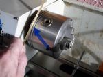 Groove on lathe for shaping rudder cage rings.