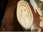 The hull is of conventional bed and butter construction with a plywood keel insert.
