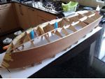 Photo 6 The hull sides are fitted, but take care not to get glue on the outer veneered surfaces and ensure a good fit at the point of the bow.