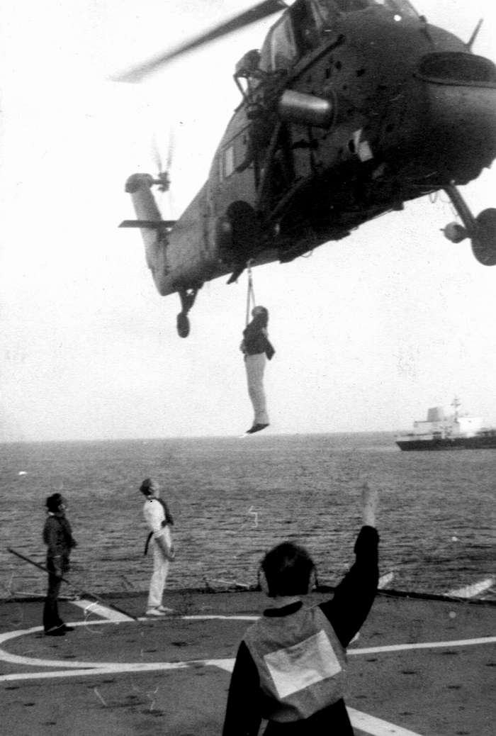 Author being lifted off by helicopter R